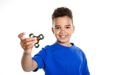 Wall Mural - Boy Fidget Spinner Held in Foreground