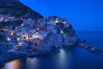 Views of Manarola, La Spezia, Italy. Landscape in the blue hour.