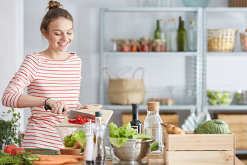 Woman preparing vegetarian meal