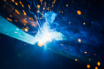 Poster - artistic welding sparks light, industrial background