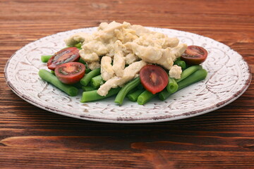 Wall Mural - Tasty green beans with chicken meat and creamy sauce