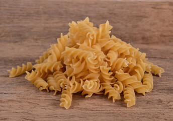 Wall Mural - macaroni on a wood background