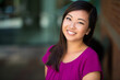 © elnariz - Cute pretty young youthful head shot of asian american woman with genuine natural smile bright colors