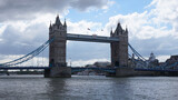 Fototapeta Londyn - Photo of tower bridge on a cloudy spring morning, London, United Kingdom