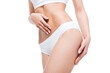 © LIGHTFIELD STUDIOS - cropped view of perfect woman's body in white underwear isolated on white
