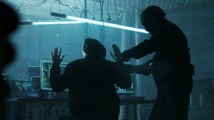 Aufkleber - Fully Armed Special Cybersecurity Forces Soldier Arrests  and Handcuffs Highly Dangerous Hacker. Hideout is Dark and Full of Computer Equipment. Shot on RED EPIC-W 8K Helium Cinema Camera.