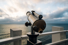 Telescope In The Beach At Sunset, Focus On Foreground