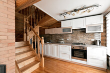 The Kitchen Room In A Rustic Log Cabin, In The Mountains. With A Beautiful Interior. House Of Pine Logs