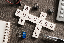 Buy Sell Success Concepts Collected In Crossword On Wooden Table