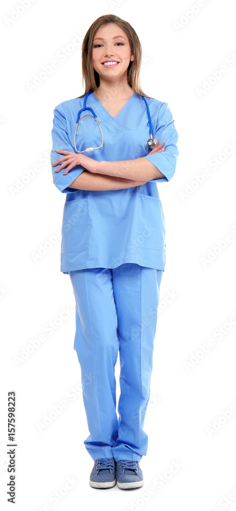 Beautiful young female doctor on white background