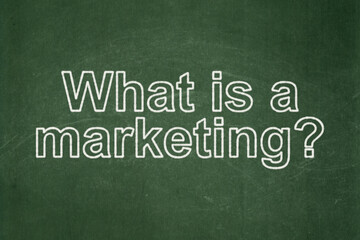 Marketing concept: What is a Marketing? on chalkboard background