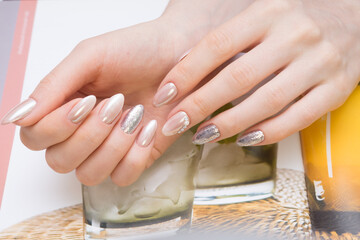 Hands with beautiful manicure. Natural nails with gel polish