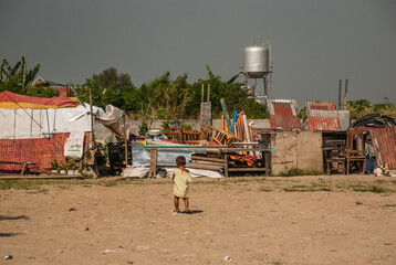 Local street with houses in the Philippines capital Manila