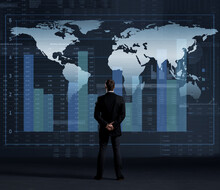 Businessman Standing Over Diagram. World Map Background. Business, Globalization, Worldwide Concept.