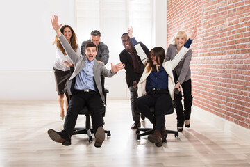 Wall Mural - Businesspeople Making Fun In The Office