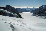 Fototapeta Do pokoju - The wide Aletsch glacier seen from the Jungfrau station looks like a river flowing towards the valley, Bernese Alps, Switzerland Europe