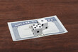 dice on social security card as to say we are gambling with social security
