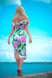 © T.Den_Team - Beautiful woman travels on the sea and joyful, have fun on a sand at sunny day