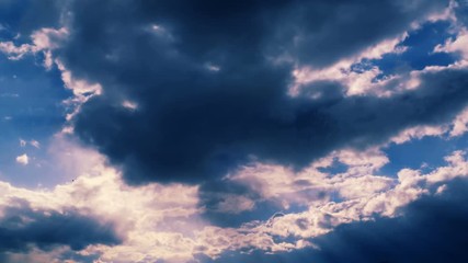 Sticker - Rays of light shining through dark clouds.