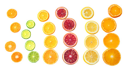 Wall Mural - Slices of citrus fruits on white background