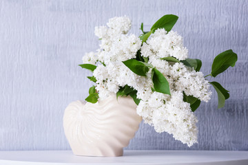 Poster - Beautiful bouquet of lilac in vase on table