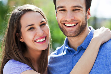 Poster - Young couple hugging
