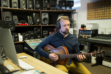 Man Composing In Studio