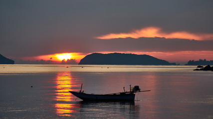 Boat on sunset background. Koh Phangan. Thailand