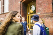 © Astrakan Images - Students (14-15) talking by school
