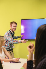 Teacher explaining the lesson to his students.