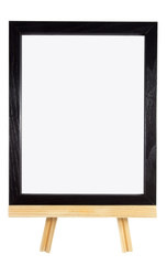 Wall Mural - Blank black wood frame on presentation easel. Copy space. Isolated. Vertical.