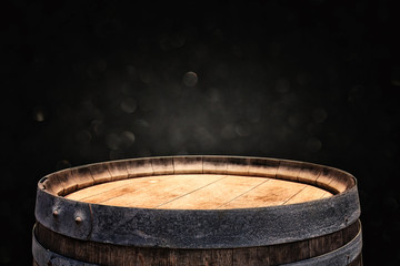 image of old oak wine barrel in front of black background