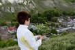 © st_fox - Woman looks from the hill to the city
