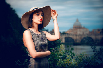 Beautiful model posing in Rome with vatican view