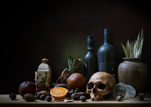Skull And Objects Expired And Dried And Rotten Fruits On The Plank In Dim Light Night / Still Life Style  And Select Focus, Space For Text.