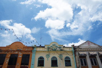 A View Of Old Building Architecture With Bright Blue Sky As A Background