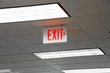 red exit sign and light on the ceiling