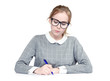 © afxhome - Young woman with glasses writes pen on paper, on white background