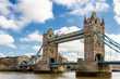 © daliu - Tower Bridge in London, the UK. Sunset with beautiful clouds. Drawbridge opening. One of English symbols