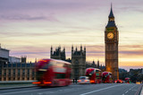 Fototapeta Londyn - Big Ben with the Houses of Parliament and a red double-decker bus passing at dusk