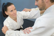 © auremar - Man and woman in karate combat