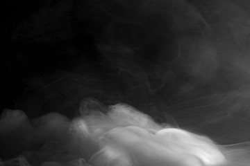 Background of abstract grey color smoke isolate on black color background. with copy space