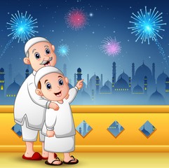 Wall Mural - Muslim grandfather with his grandson celebrate for eid mubarak 