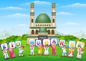 Happy cartoon kids celebrate eid mubarak