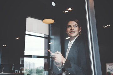 Wall Mural - Portrait of charming business lady working in big open space office