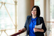 © fotofrol - Successful business woman working with computer and tablet.