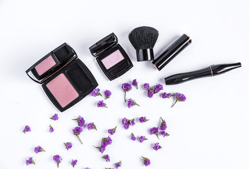 Makeup brush and cosmetics, on a white background isolated,