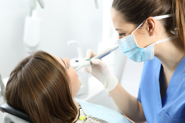 Dentist working with a patient