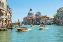 Water Taxis Sails On Grand Canal, Venice, Italy. Travel And Vacation Concept.