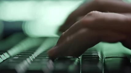 Wall Mural - closeup shot of hands of programmer typing fast on computer keyboard